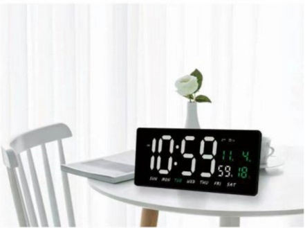 Электронные часы с календарем и темометрлме